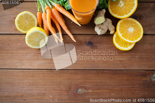 Image of glass of carrot juice, fruits and vegetables