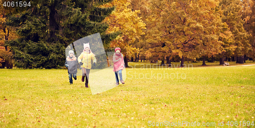 Image of group of happy little kids running outdoors