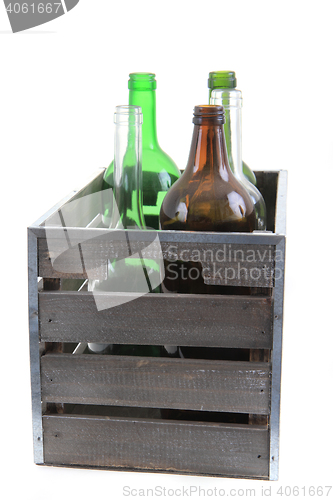 Image of glass bottles in wooden case