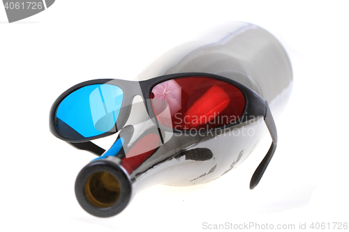 Image of 3d plastic glasses and bottle