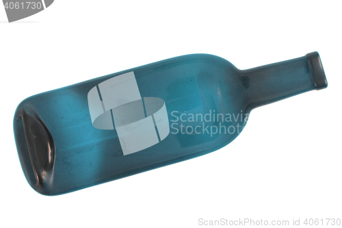 Image of flat blue glass bottle