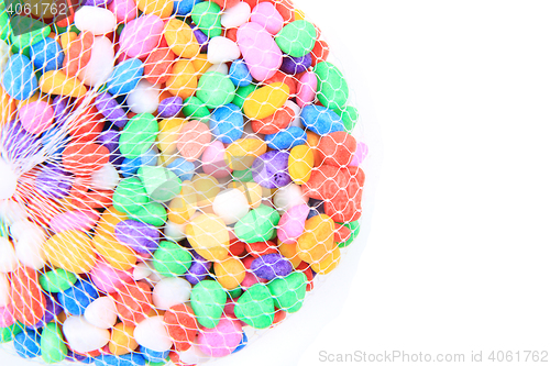 Image of boulders with plastic colors as background