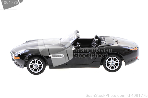 Image of black car model toy