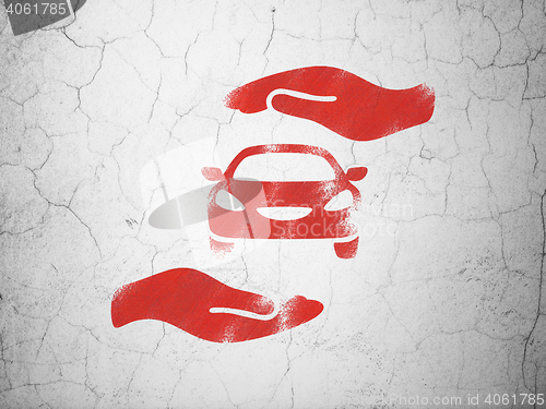 Image of Insurance concept: Car And Palm on wall background