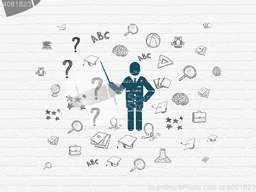 Image of Learning concept: Teacher on wall background