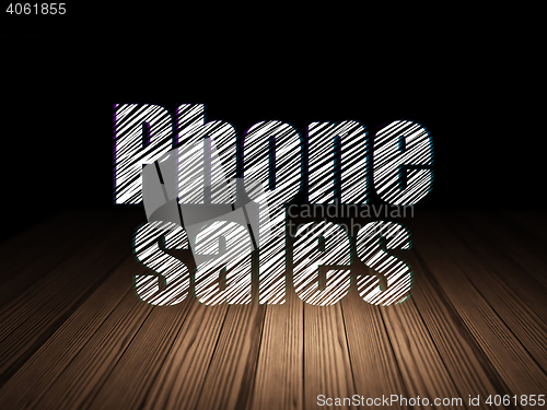 Image of Advertising concept: Phone Sales in grunge dark room