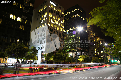 Image of moving car with blur light through Dronning Eufemias gate street