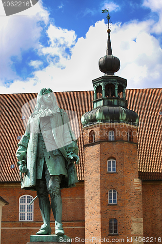 Image of The statue of Chancellor Peder Griffenfeld and a tower in Copenh