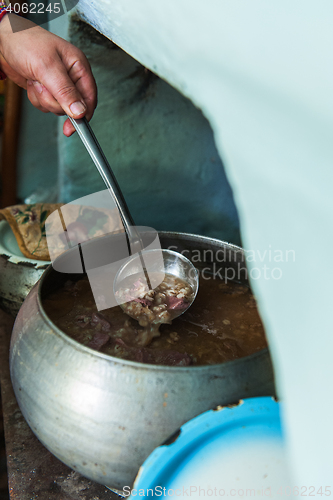 Image of cooking meals in a Russian stove