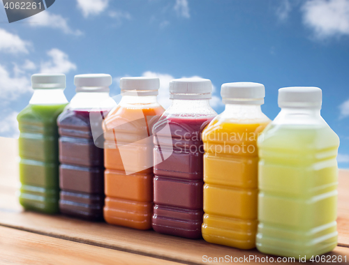 Image of bottles with different fruit or vegetable juices