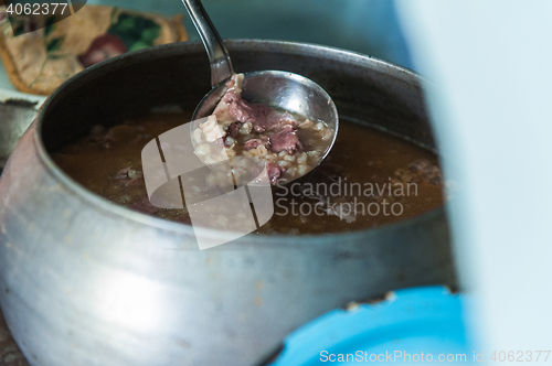 Image of cooking meals in a Russian stove