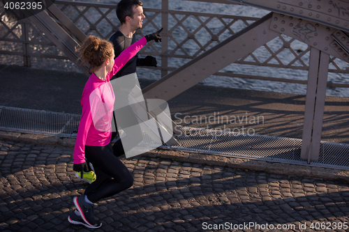 Image of young  couple jogging