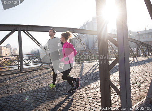 Image of young  couple jogging