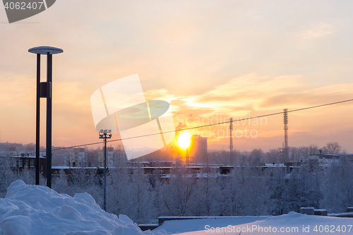 Image of Winter sunset glow in city