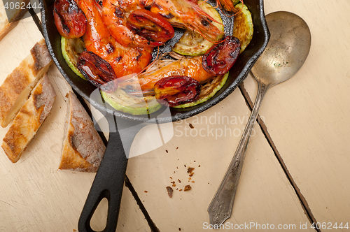 Image of roasted shrimps with zucchini and tomatoes