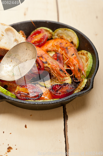 Image of roasted shrimps with zucchini and tomatoes