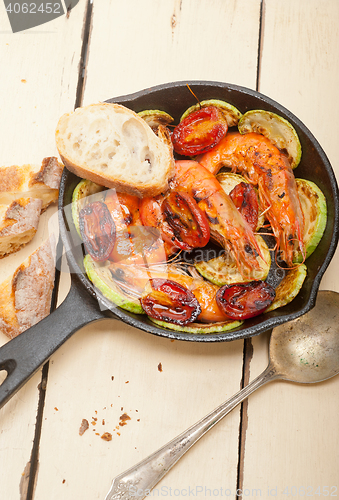 Image of roasted shrimps with zucchini and tomatoes