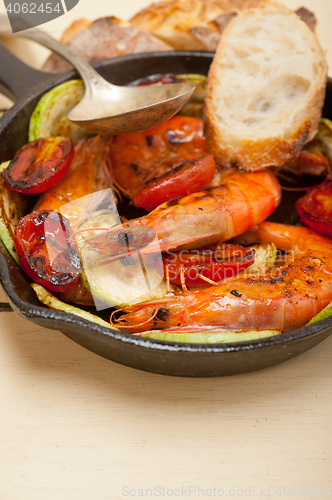 Image of roasted shrimps with zucchini and tomatoes