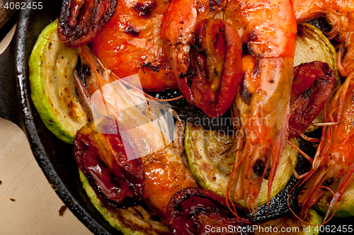Image of roasted shrimps with zucchini and tomatoes