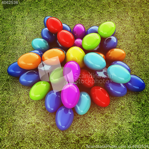 Image of Colored Easter eggs as a flower on a green grass. 3D illustratio