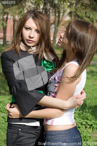 Image of two nice girls on the nature