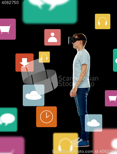 Image of happy man in virtual reality headset or 3d glasses