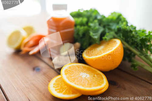 Image of orange with carrot juice, fruits and vegetables