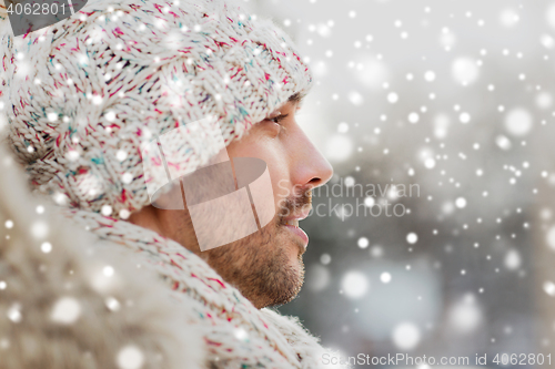 Image of face of happy man outdoors in winter