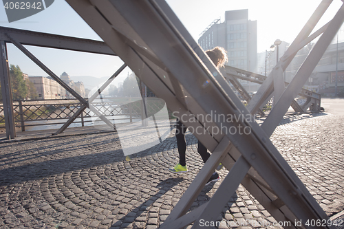 Image of young  couple jogging