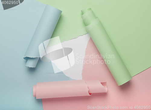 Image of Abstract torn colored paper background