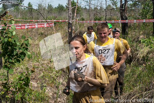 Image of Team runs between stages in extrim race.Tyumen