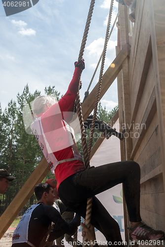 Image of Teams storm wall in extrim race. Tyumen