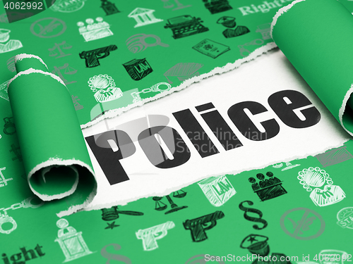 Image of Law concept: black text Police under the piece of  torn paper