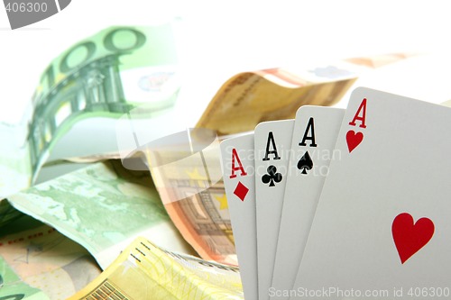 Image of money and aces
