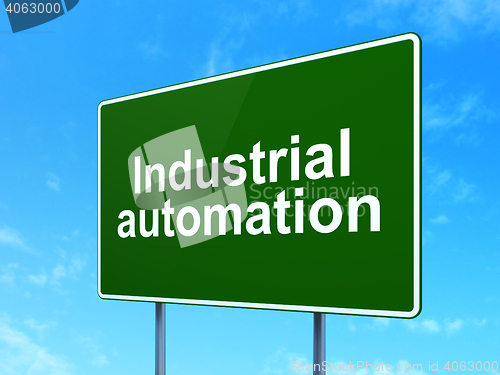 Image of Industry concept: Industrial Automation on road sign background