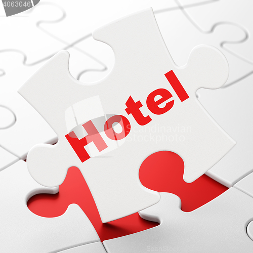 Image of Vacation concept: Hotel on puzzle background