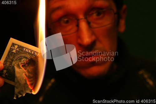 Image of Dollar in Fire