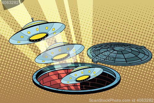 Image of UFOs fly out of the sewers