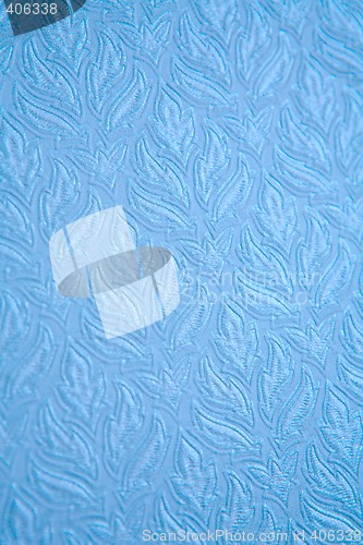 Image of pattern on blue surface
