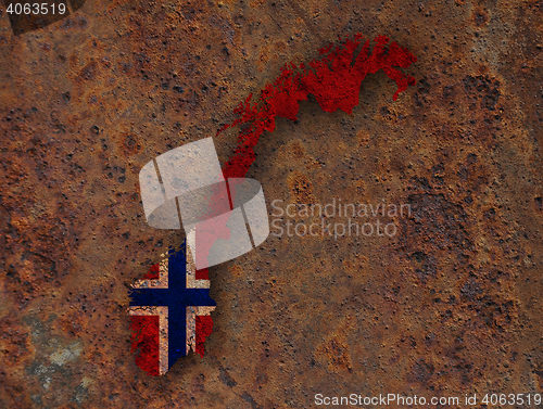 Image of Map and flag of Norway on rusty metal