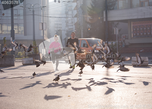 Image of young  couple jogging