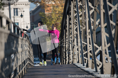 Image of young  couple jogging