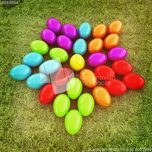 Image of Colored Easter eggs as a flower on a green grass. 3D illustratio