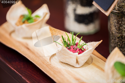 Image of close up of dough cornet with beetroot filling