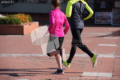 Image of young  couple jogging