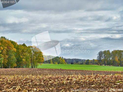 Image of landscape with fields and clouds