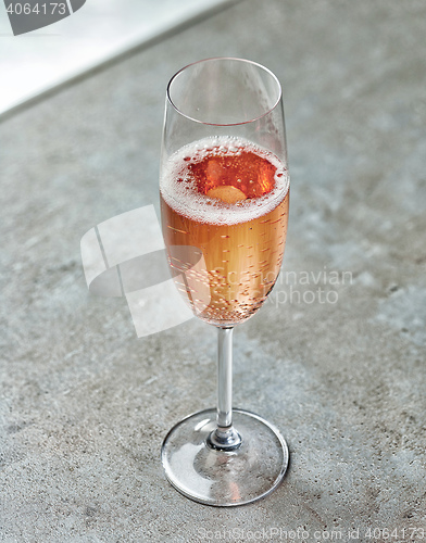 Image of glass of pink champagne