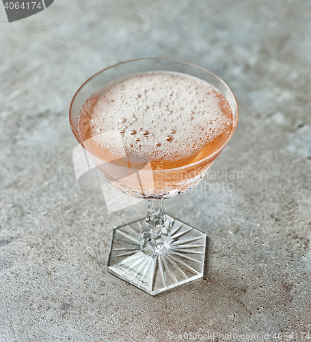 Image of glass of pink champagne