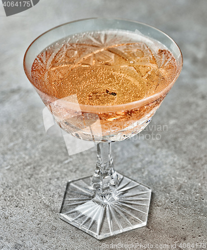 Image of glass of pink champagne