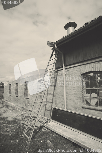 Image of Ladder at an old weathered barn